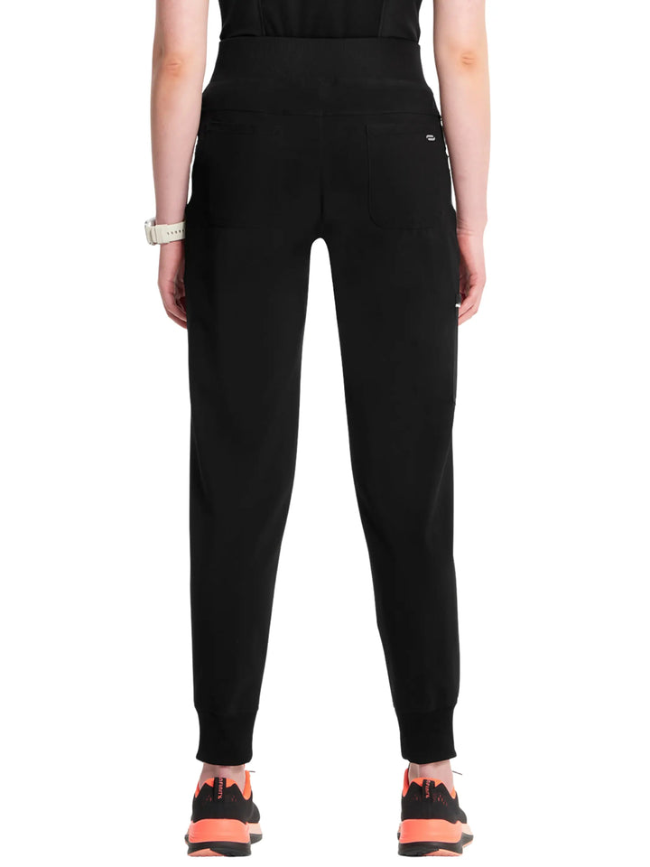 The back of the Infinity Women's Mid Rise Tapered Jogger Scrub Pant in Black featuring two back patch pockets.