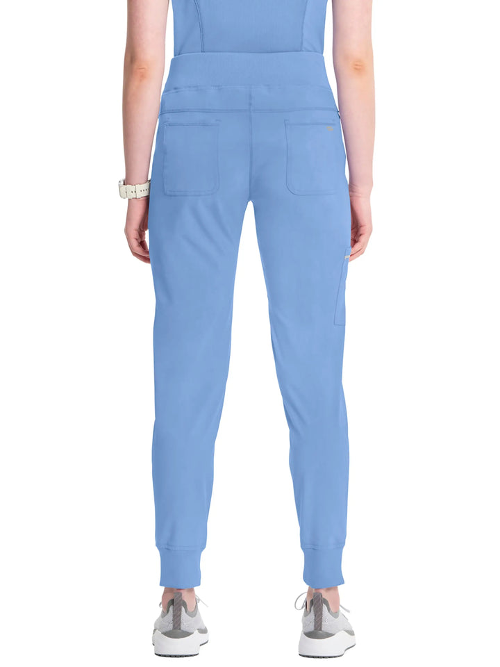 A look at the back of the Infinity Women's Mid-Rise Scrub Jogger in Ceil Blue size Small featuring two back pockets and a rib knit elastic waistband.