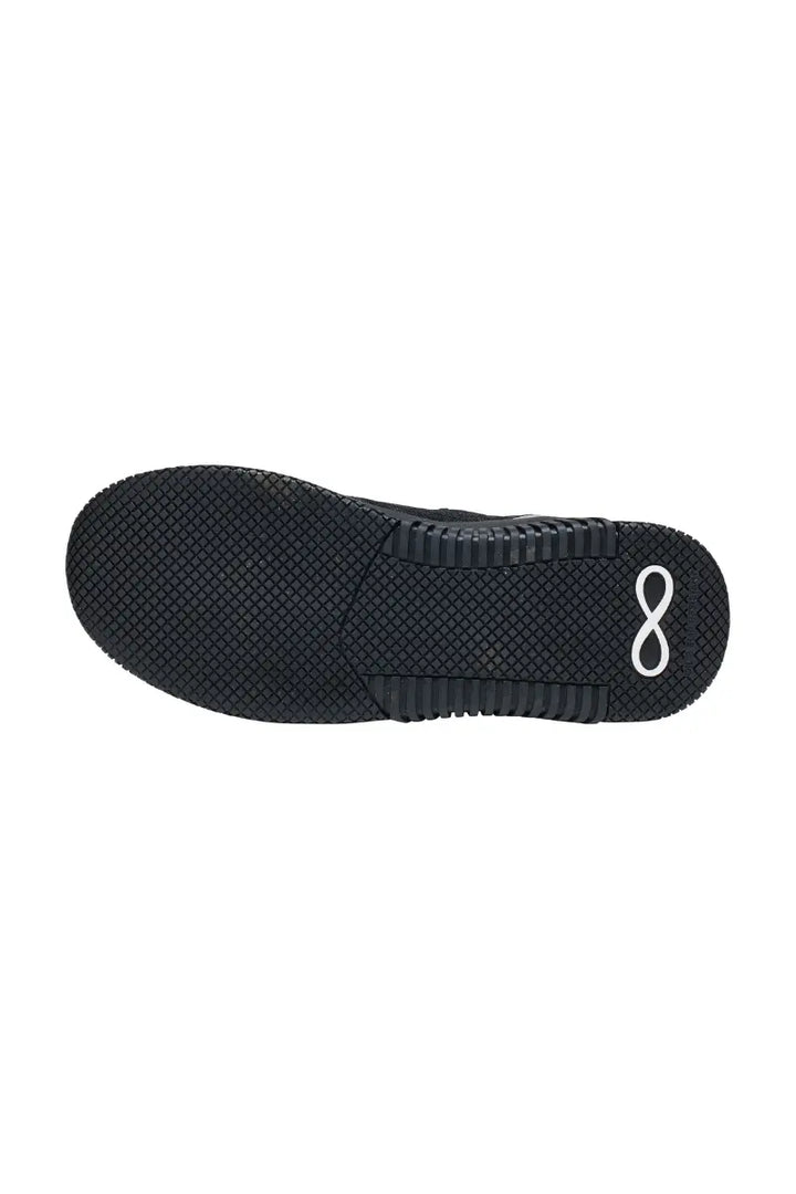 The bottom of the Infinity Women's Dart Premium Athletic Nursing Shoes in Black Reflective size 8.5 featuring a slip-resistant, rubber outsole to help improve traction across a variety of surfaces.