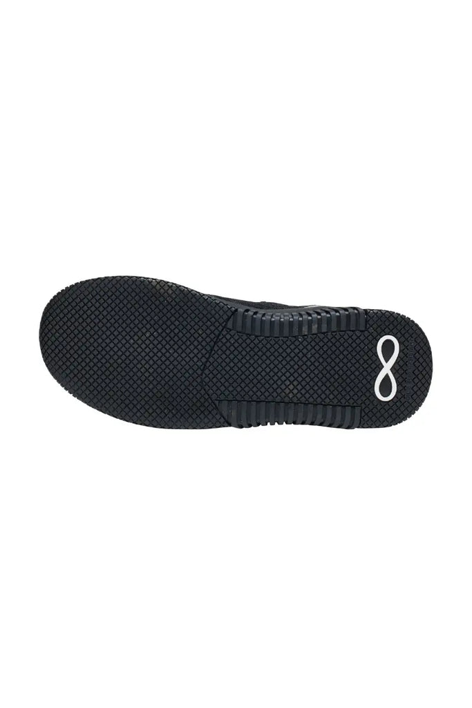 The bottom of the Infinity Women's Dart Premium Athletic Nursing Shoes in Black Reflective size 8.5 featuring a slip-resistant, rubber outsole to help improve traction across a variety of surfaces.