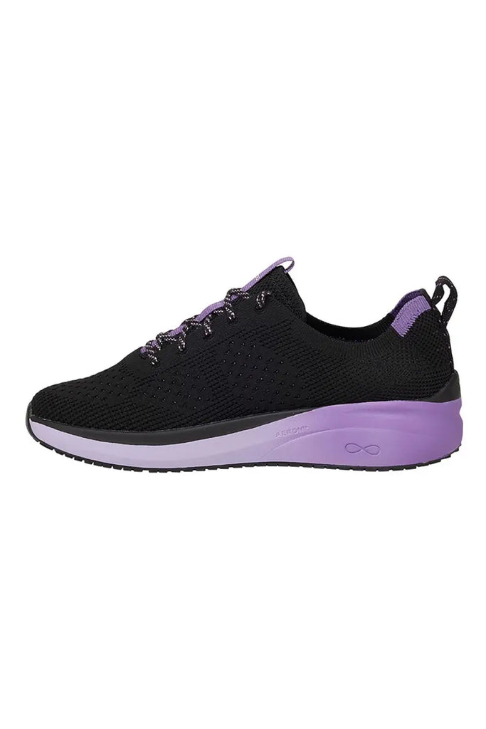 The side of the Infinity Women's Ever On Athletic Nurse Shoe in Purple Surge size 7.5 featuring an athletic silhouette.