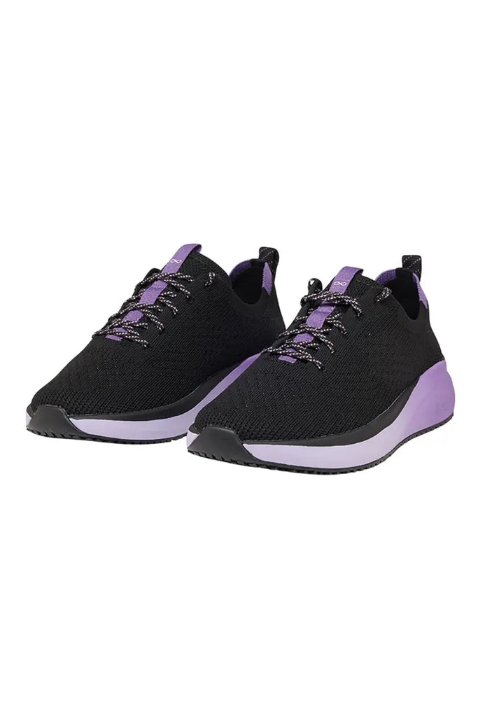 The front of the Infinity Women's Ever On Knit Athletic Nurse Shoes in Purple Surge featuring a lace-up vamp that provides an adjustable and comfortable fit.