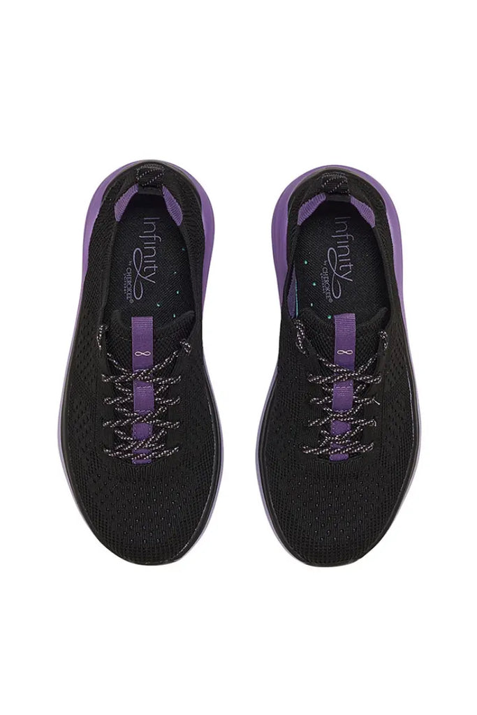 A top down look at the Infinity Women's Ever On Knit Athletic Nurse Shoes in Purple Surge size 9 featuring a removable shock-absorbing insole with arch support and heel cupping.