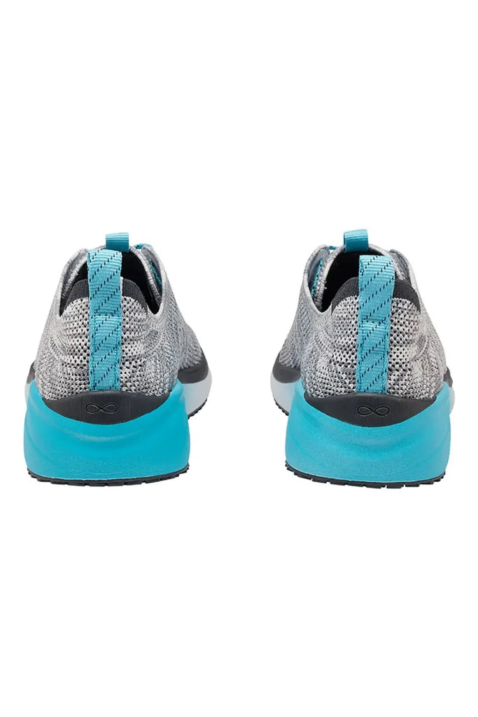 The back of the infintiy Women's Ever On Knit Athletic Nurse Shoes in Aqua Fade featuring bootstraps at the heels.