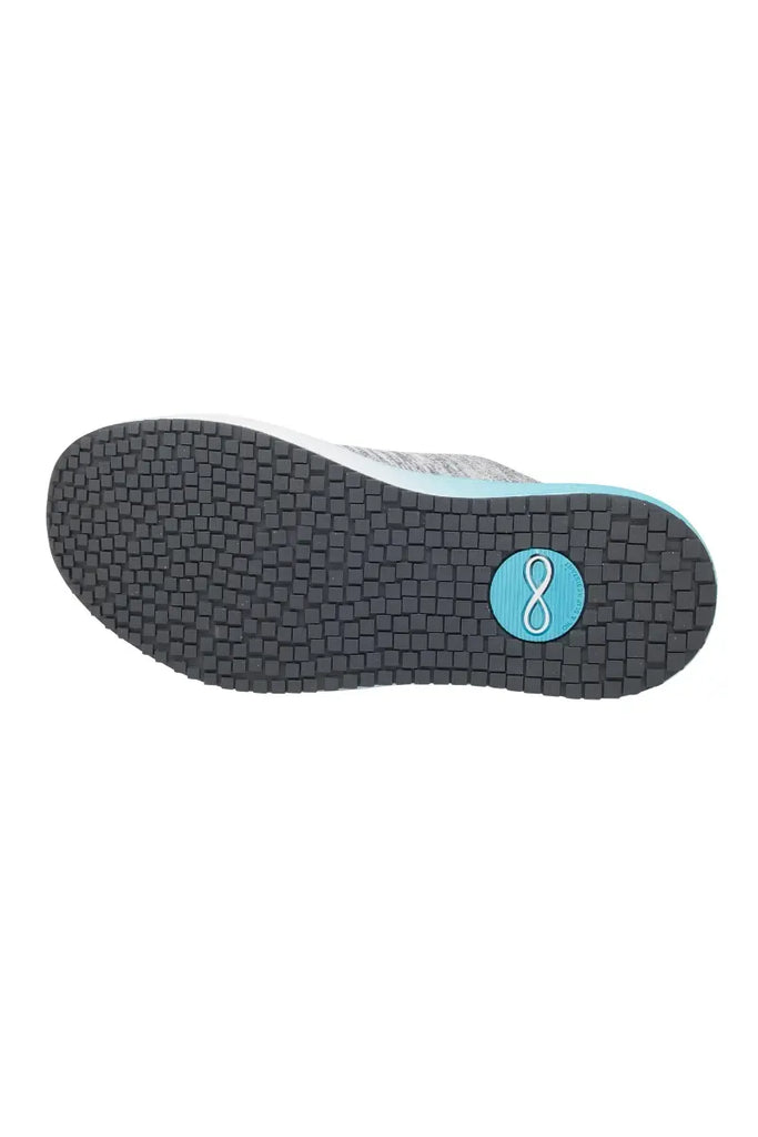 The bottom of the Infinity Women's Ever On Knit Athletic Nurse Shoes in Aqua Fade featuring a slip resistant outsole for improved traction on various surfaces.