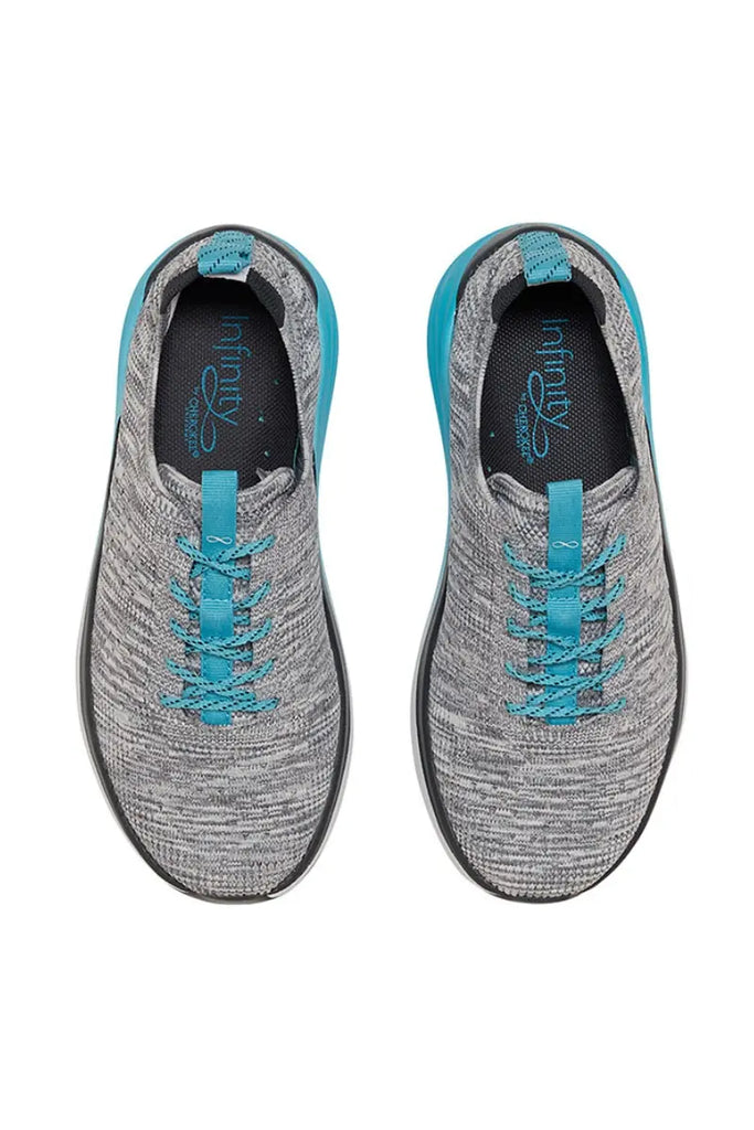 A top down look at the Infinity Women's Ever On knit Athletic nurse Shoes in Aqua Fade featuring a removable latex-free polyurethane insole that improves arch support and provides additional comfort.