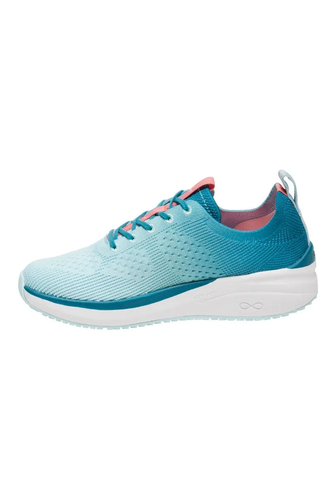 The side of the Infinity Women's Ever On Knit Athletic Nurse Shoes in Oceanic Ombre size 9 featuring an athletic silhouette. 