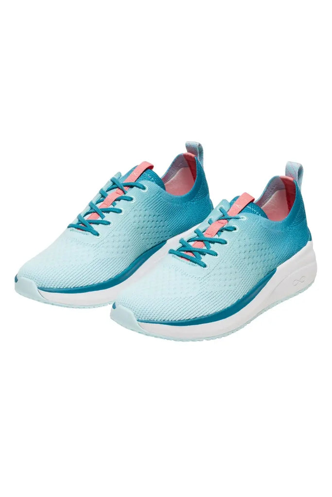 The front of the Infinity Women's Ever On Knit Athletic Nurse Shoes in Oceanic Ombre featuring a lace-up vamp for an adjustable and comfortable fit.