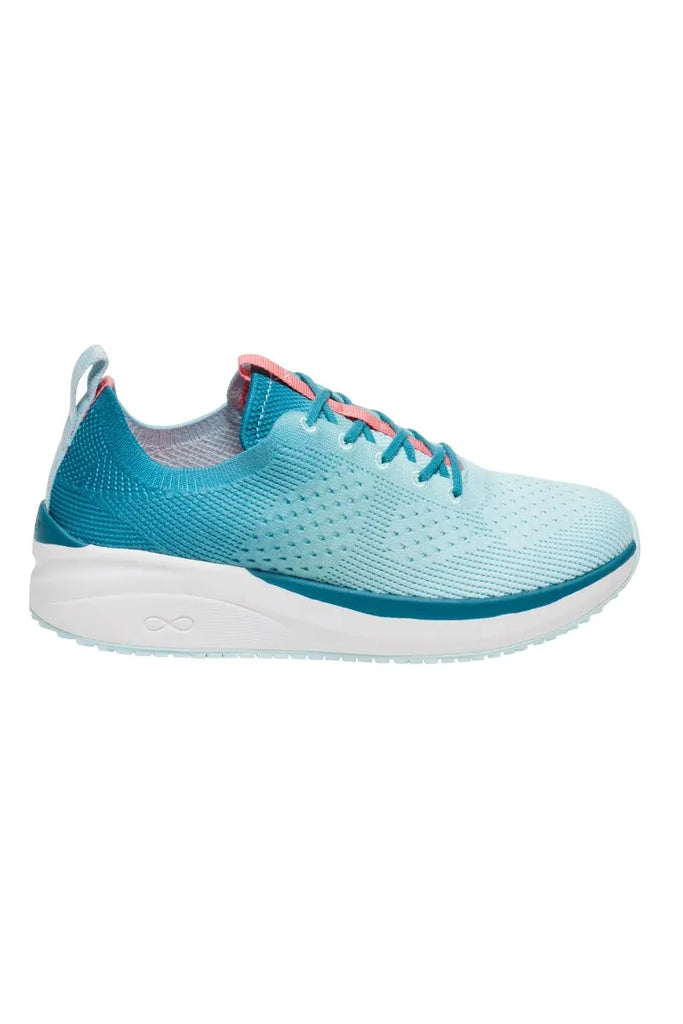 The outside of the Infinity Women's Ever On Knit Athletic Nurse Shoes in Oceanic Ombre size 8 featuring an AERON™ EVA midsole that is thicker in the heel for cushioning where you need it most.