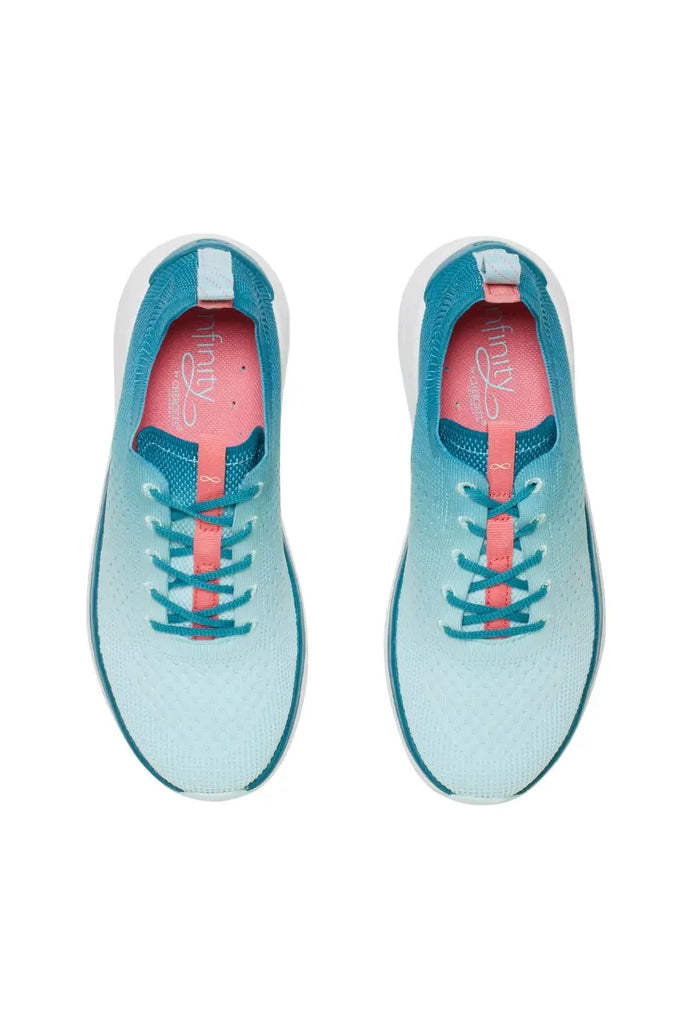A top down look at the Infinity Women's Ever On Knit Athletic Nurse Shoes in Oceanic Ombre size 8.5 featuring a removable shock-absorbing insole with arch support and heel cupping.