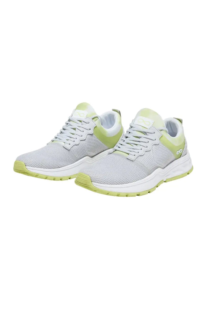 The front of the Infintiy Women's Fly Athletic Nurse Shoes in Cloudy Lime featuring a breathable mesh fabric upper that keeps your feet cool and comfortable all day.