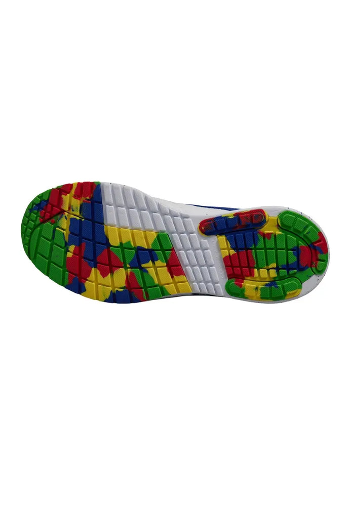 The unique, multi-colored puzzle piece print on the sole of the Infinity Women's Volta Athletic Nurse Shoes in "Piece Out".