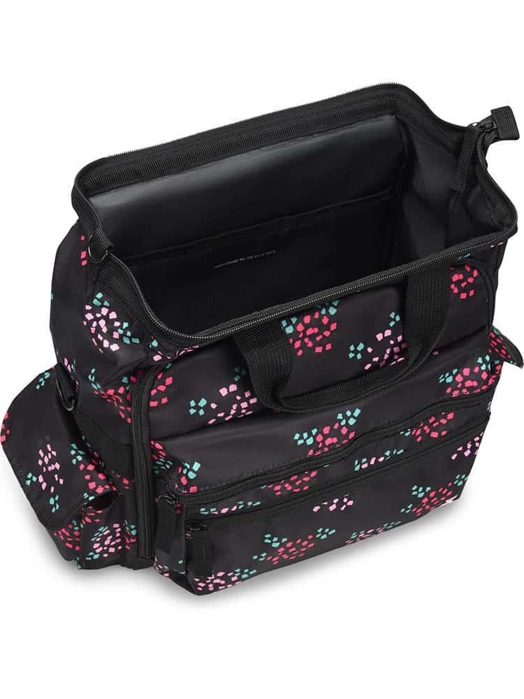 A top down picture of the Nurse Mates Ultimate Medical Bag in "Confetti Flower with Ribbon" featuring a large hinged mouth for all of your on the go storage needs.