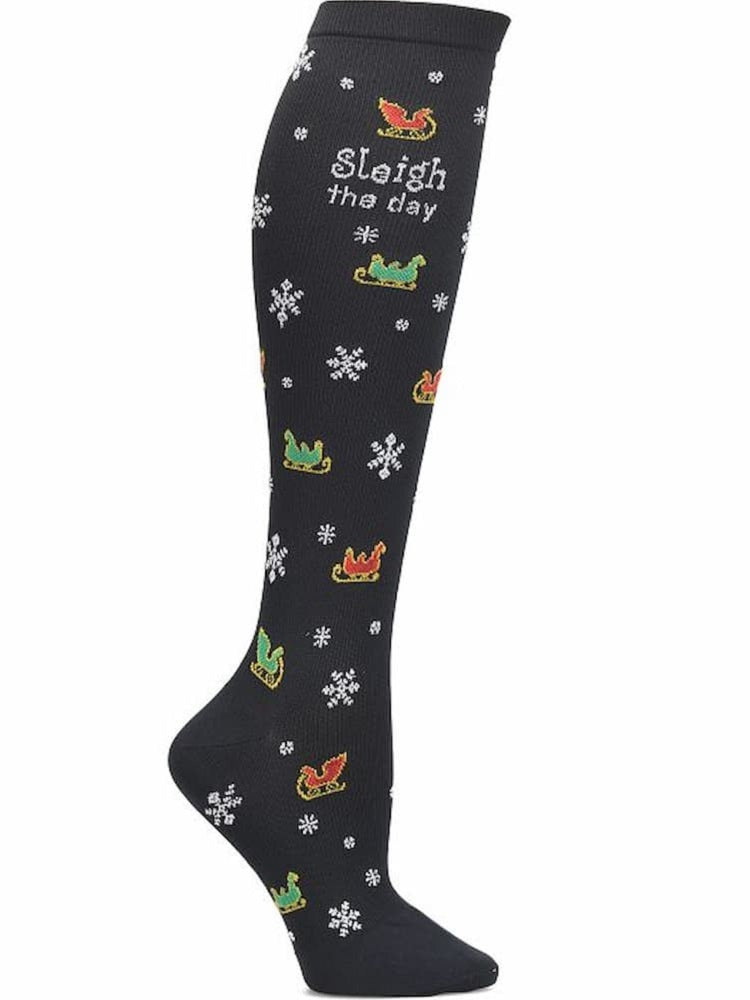 An image of the side of the of Women's Compression Socks from NurseMates in "Sleigh the Day" featuring 12-14 mmHg Graduated Compression to help improve circulation and relieve leg fatigue.