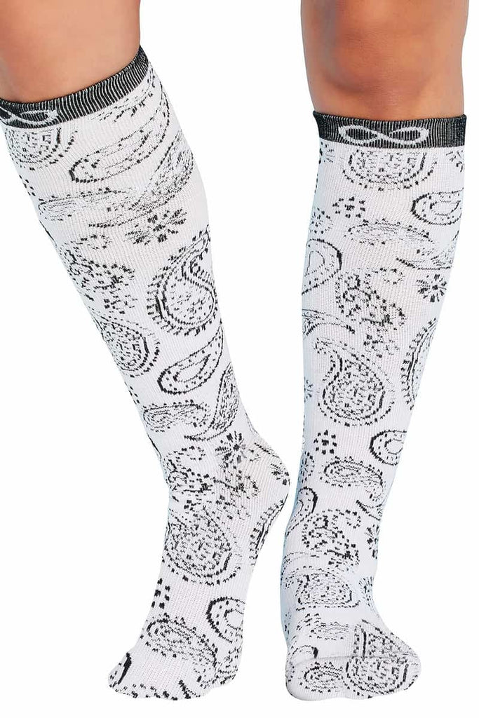 The front of the Infinity Women's Kickstart Compression Socks in Paisley Passion featuring a wool-blend fabric with moisture wicking properties.