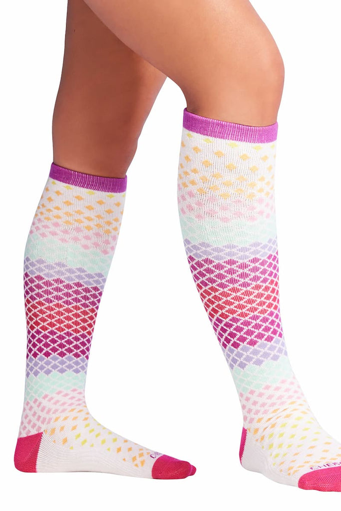 The side of the Cherokee Women's Knee High Compression Sock in Pure featuring 15-20 mmHg to improve blood flow.