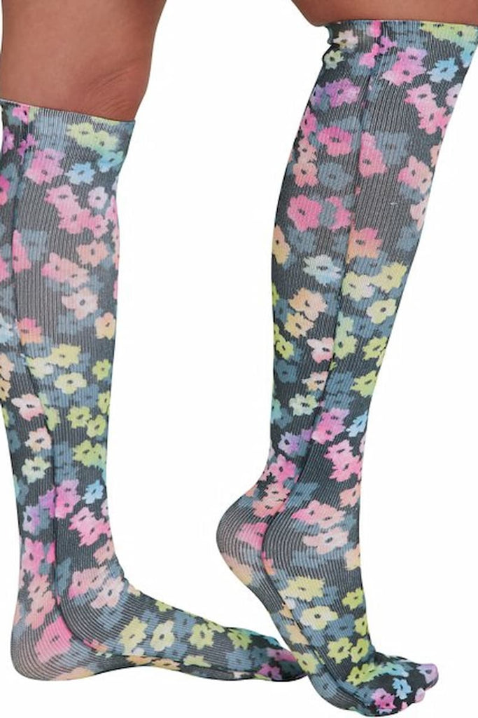 The side of the HeartSoul Women's Support Compression Socks in Rainbow Blossoms featuring a unique fabric made of 90% Nylon and 10% Spandex.