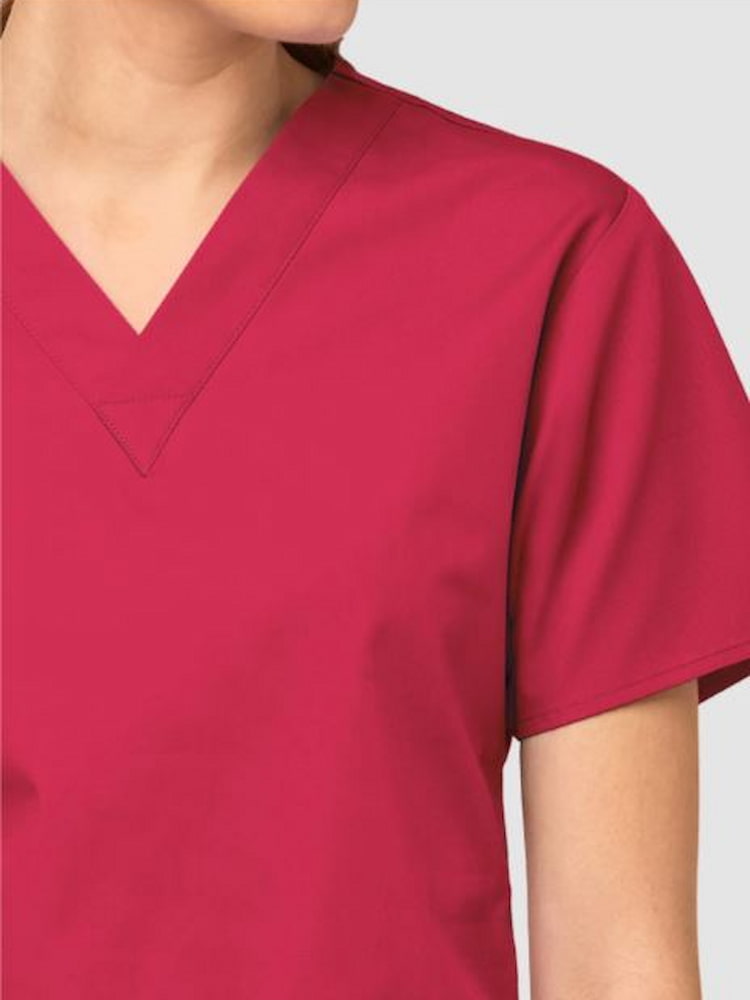 An up close image of the V-neckline of the WonderWink Women's Bravo Scrub Top in Red size 5Xl.