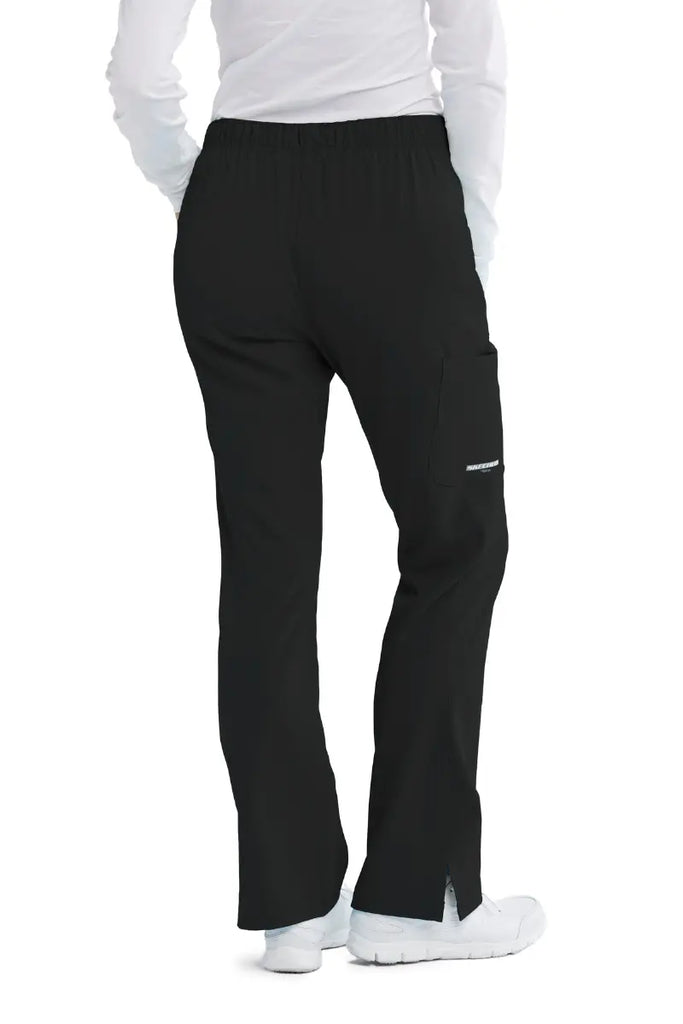 The back of the Skechers women's Reliance Cargo Scrub Pant in Black size XS featuring back elastic and a junior contoured fit.