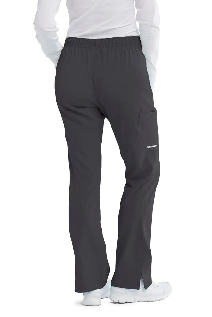The back of the Skechers Women's Reliance Cargo Scrub Pant in Pewter size Large featuring a shaped moderate flare leg.