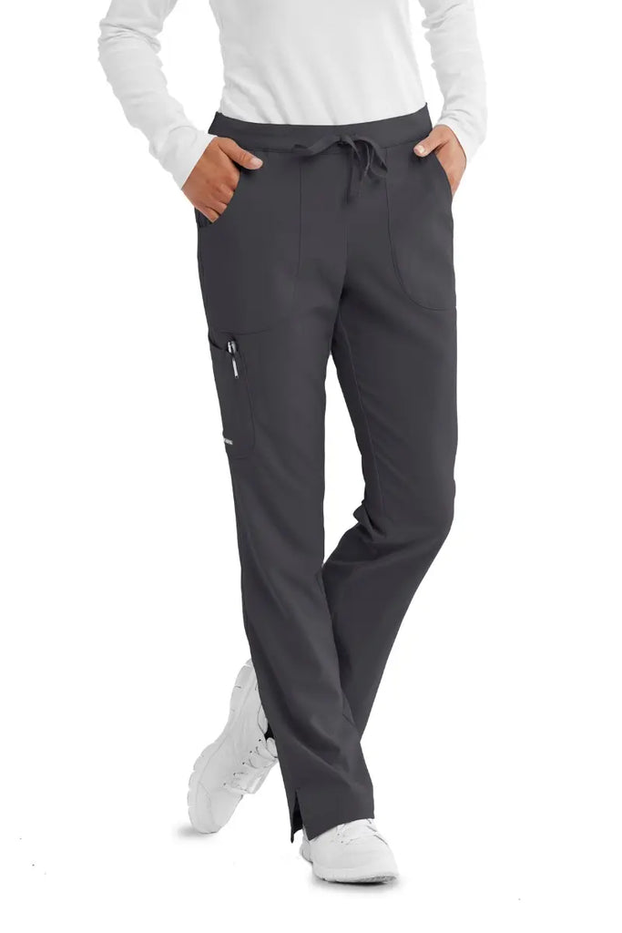 The front of the Skechers Women's Reliance Cargo Scrub Pant in Pewter size Medium featuring an adjustable drawstring tie closure.