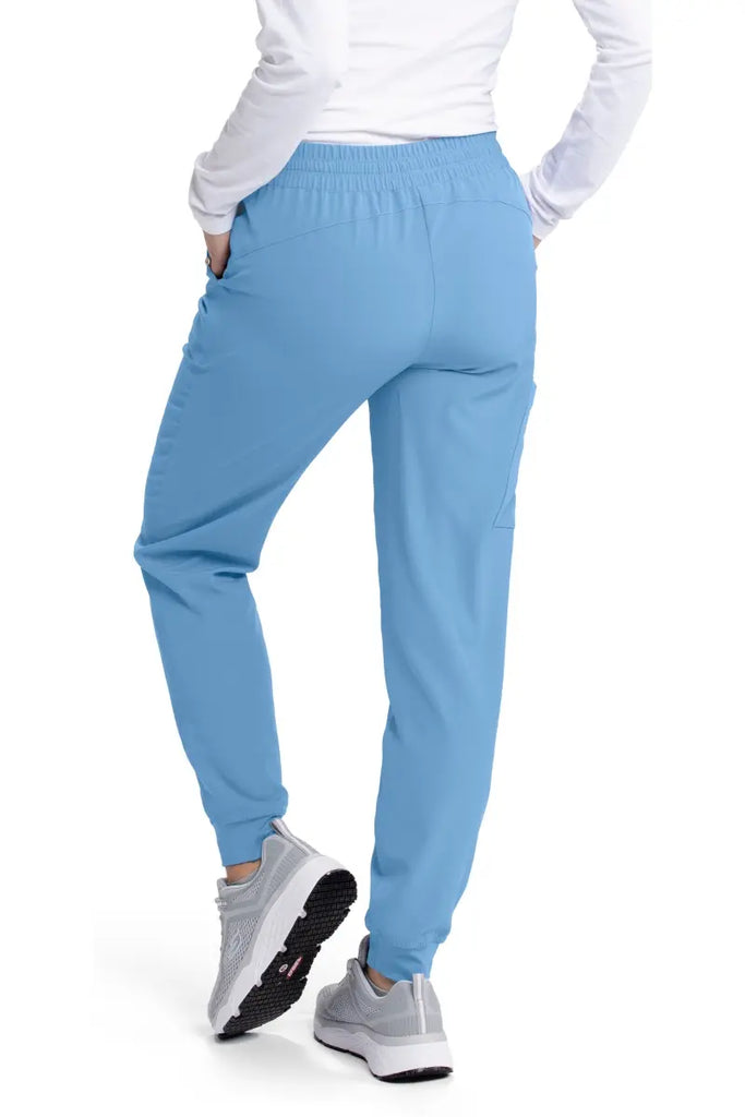 The back of the Skechers Women's Theroy Scrub Joggers in Ceil Blue size Large featuring knit cuffs at the ankles to provide an athletic look and feel.
