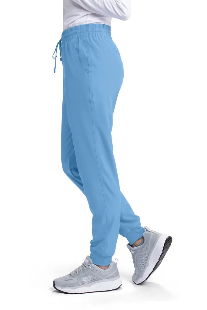 The right side of the Skechers Women's Theory Scrub Jogger in Ceil size XL featuring a drawstring waistband.