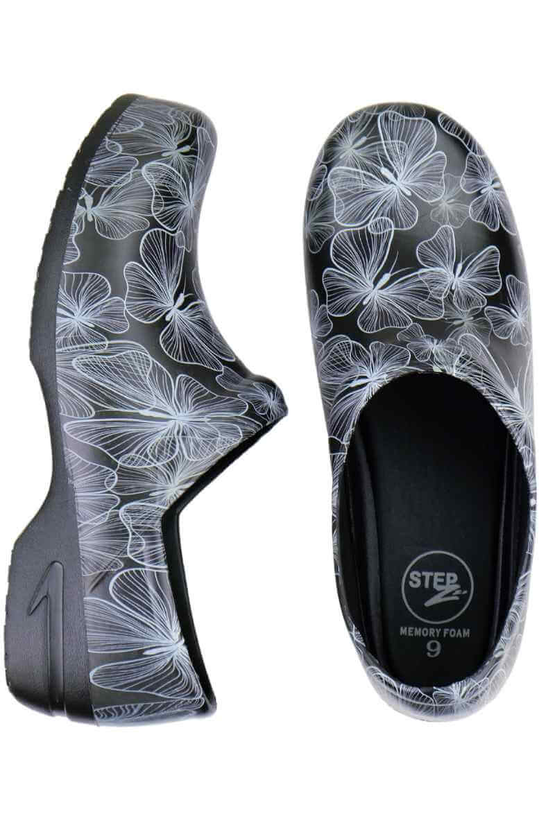 A picture of the top and heel of the StepZ Women's Slip Resistant Nurse Clogs in "Transparent Butterflies" size 7 featuring added cushioning & support with a removable foot bed insert.