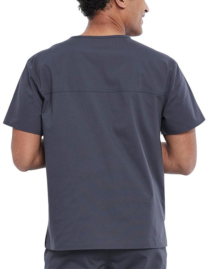 A Pharmacy Technician showcasing the back of the Cherokee Unisex Pocketless Top in Pewter size Medium featuring a center back length 27.5".