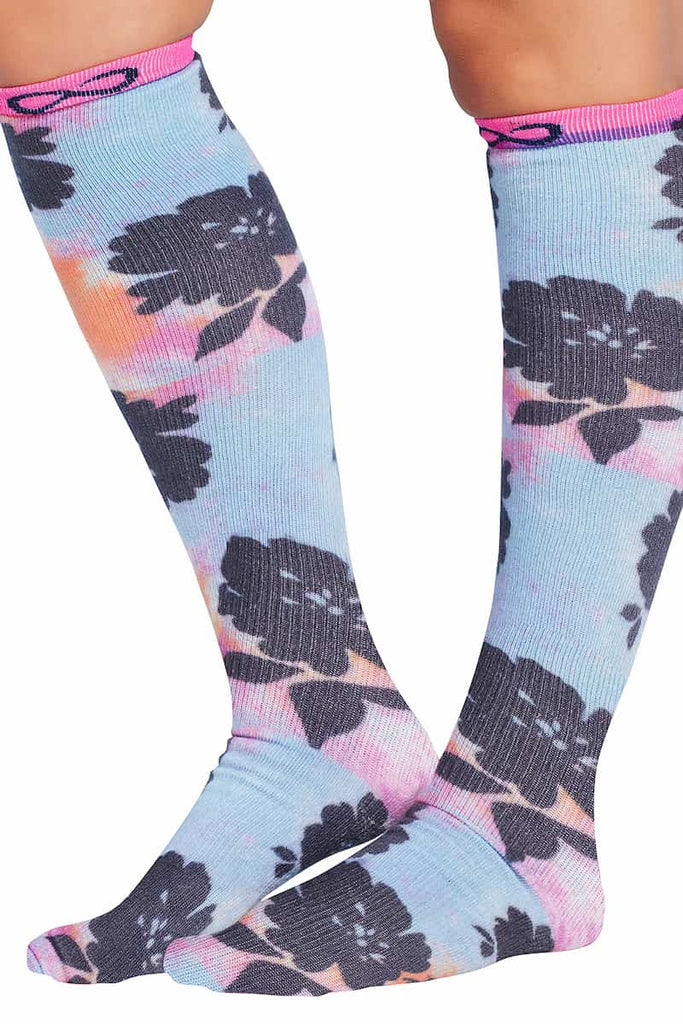 The sides of the Infinity Women's Kickstart Compression Socks in Artistic Blooms featuring 15-20 mmHg of compression to prevent swelling and varicose veins.