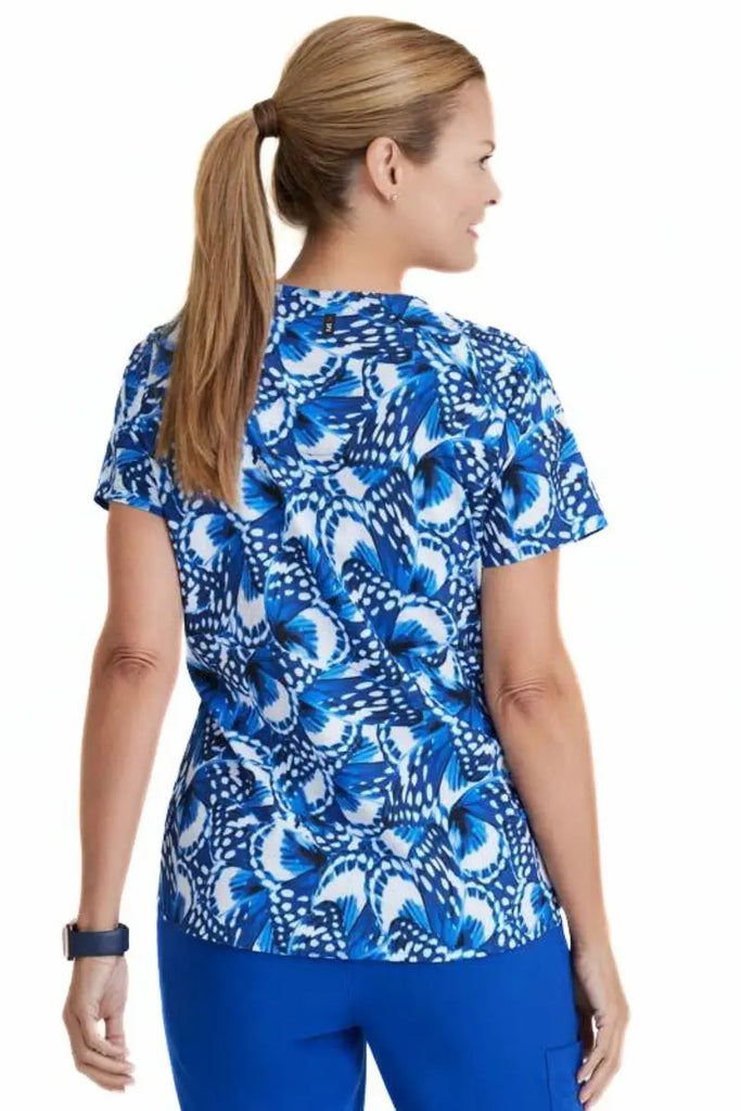 The back of the Grey's Anatomy Women's Printed Scrub Top in "Butterfly Blues" in size medium featuring a center back length of 27.25".