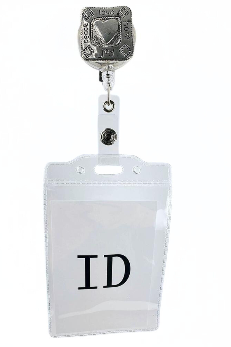 The Badge Reel with ID Holder in Silver Heart featuring a removable vinyl badge holder.