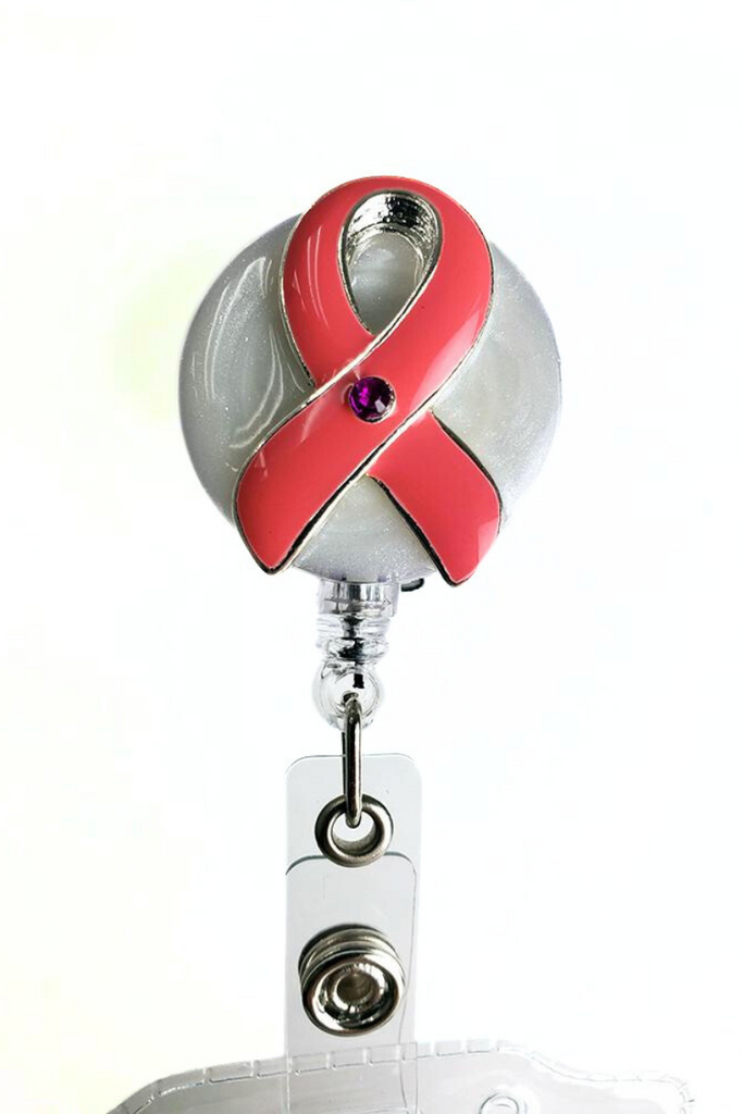 The Badge Reel with ID Holder in Pink Ribbon featuring 25" retractable cord.