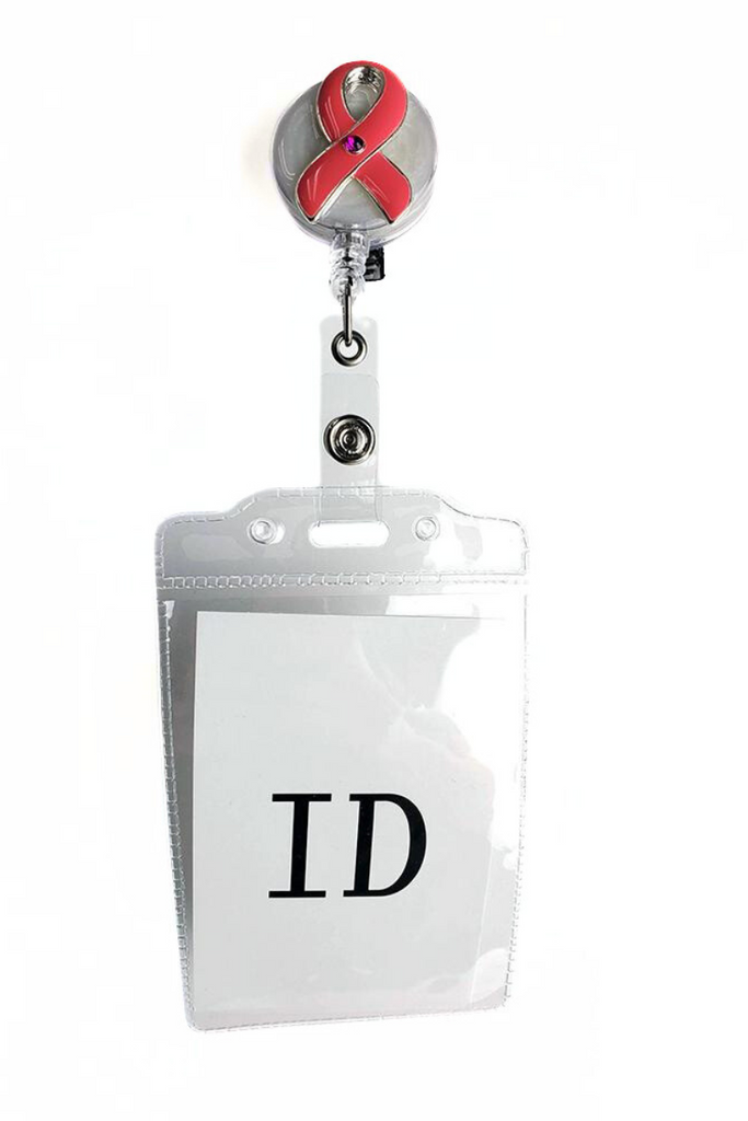 The Badge Reel with ID Holder in Pink Ribbon featuring a removable vinyl badge holder.