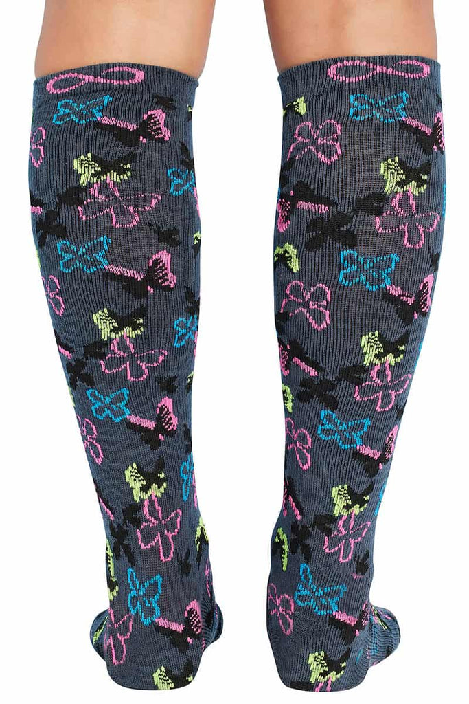 The back of the Infinity Women's Kickstart Compression Socks in Butterfly Bloom featuring moderate level of compression to help prevent swelling and varicose veins.