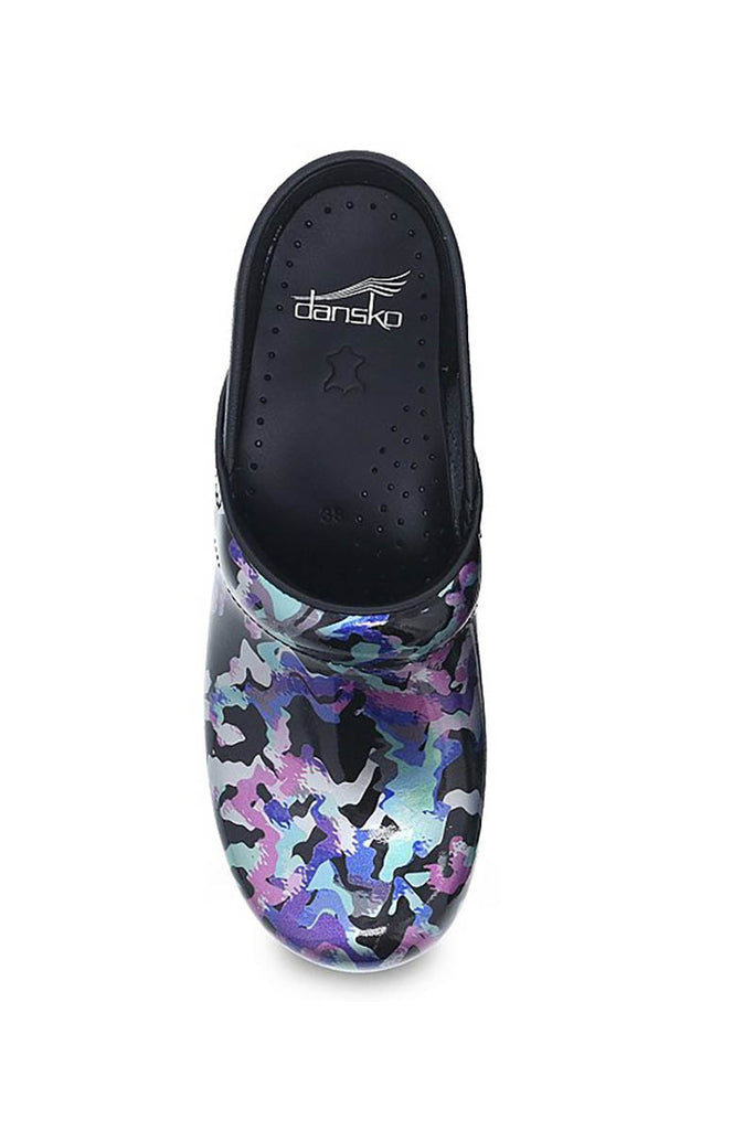 An aerial view of the Dansko Professional Nurse's Shoe in "Mermaid Patent" featuring a PU outsole with a rocker bottom, offering superior shock absorption.