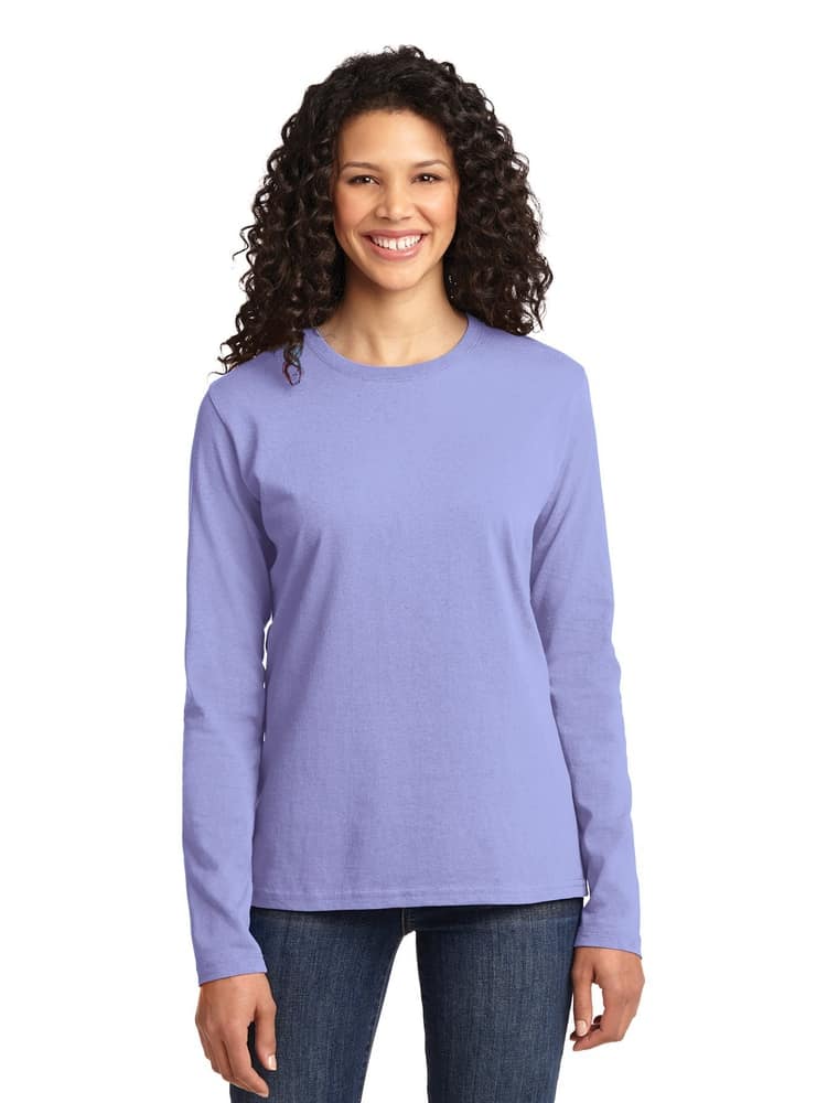 A young female Dental Hygienist  wearing a Flexibiltee Women's Crew Beck Long Sleeve Tee in Ceil size XL featuring a tag-less neckline & side seam to provide a comfortable and flattering fit all day long. 