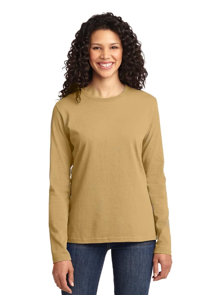 A young female MRI Tech wearing a Flexibiltee Women's Crew Neck Long Sleeve Tee in Khaki size XL featuring side seams for a contoured body & flattering fit.