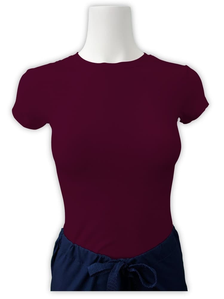 Mannequin wearing Flexibilitee women's Junior Cut Short Sleeve Crew Neck Tee in magenta size small