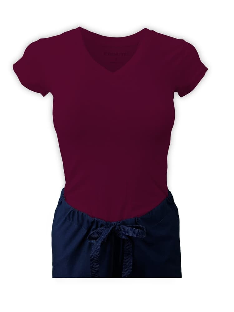 A Flexibilitee Women's V-Neck Scrub Top in Magenta size Large featuring a junior fit and a ribbed V-neckline.