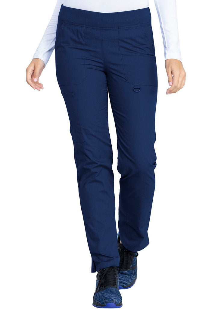 A picture of a young female Phlebotomist wearing a pair of Dickies EDS signature Women's Pull-on Scrub Pants in Navy size Large Tall featuring a contemporary fit.