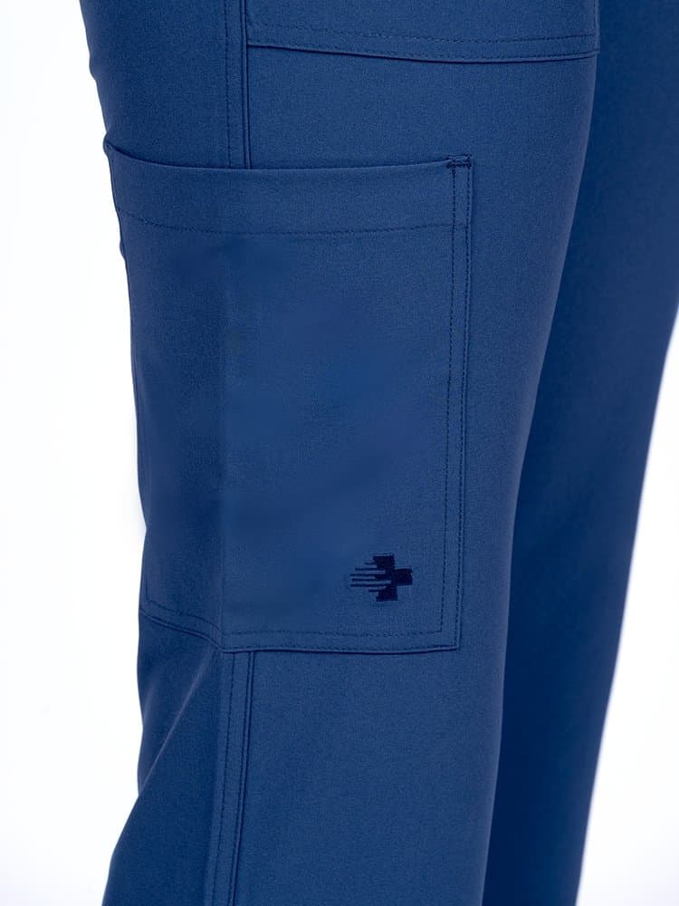 Meraki Sport Women's Elastic Waist Scrub Pant in navy featuring 4 pockets including a cargo pocket.