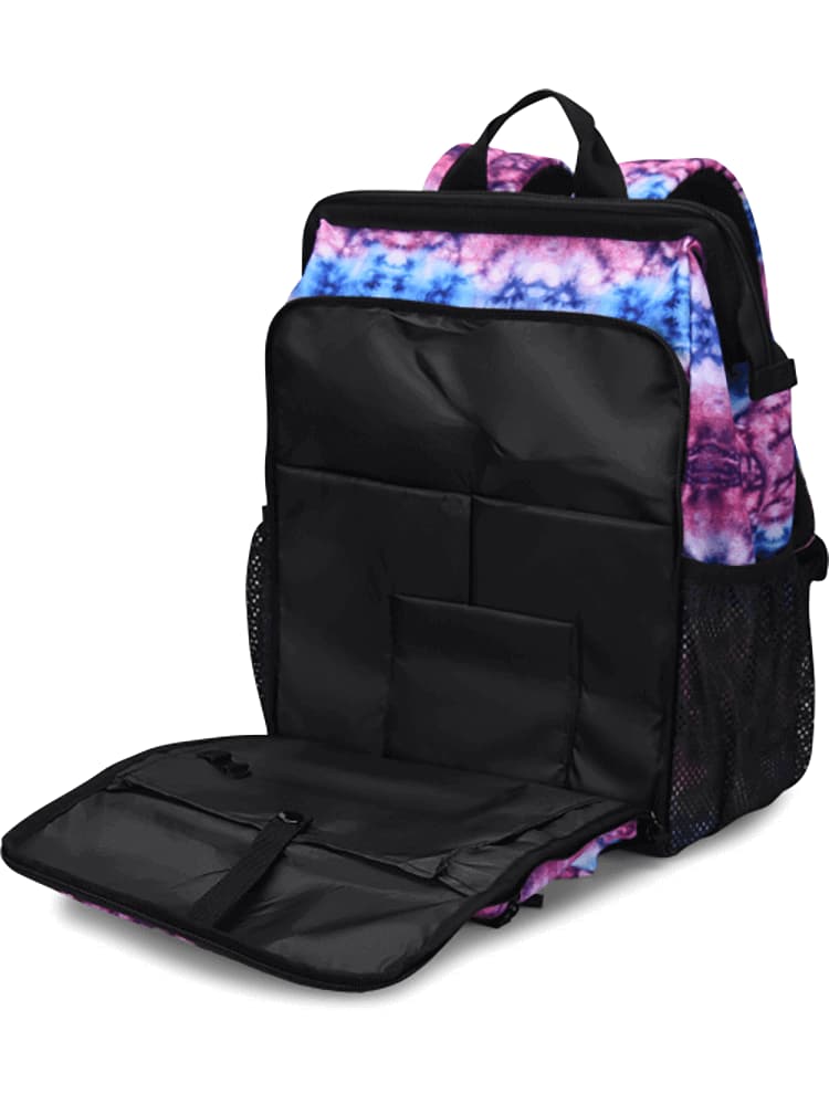 An image of the NurseMates Ultimate Backpack in "Berry Blue Tie Dye" featuring an insulated front zipper pocket.