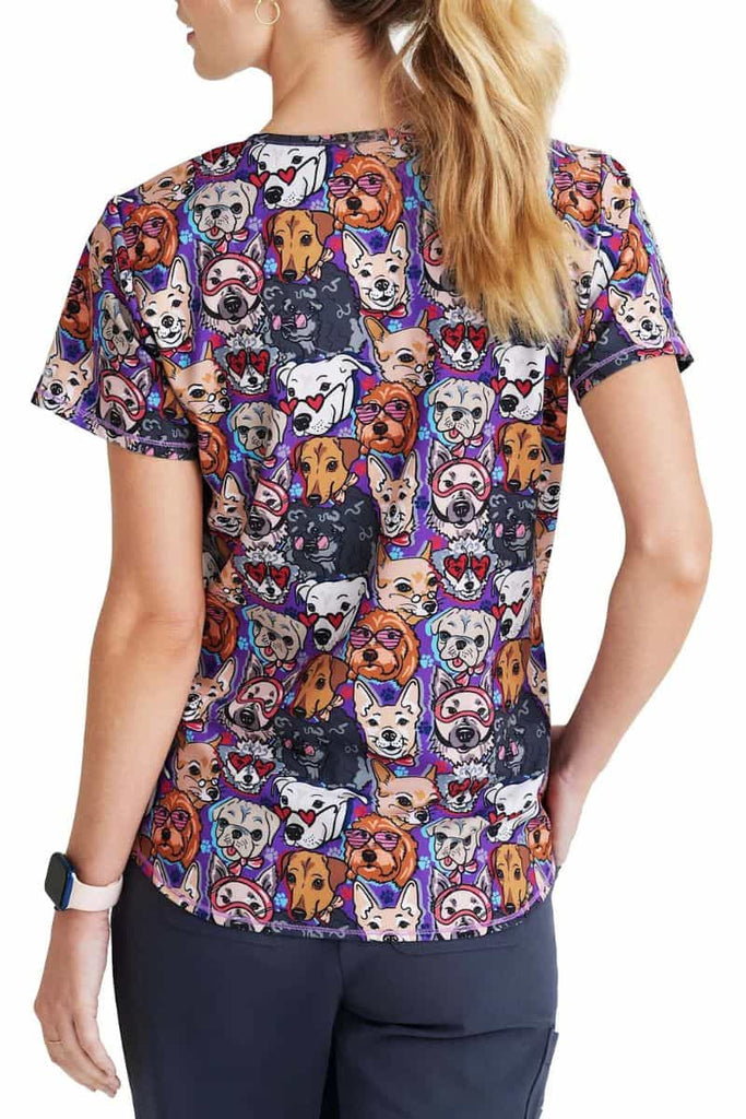 The back of the Skechers Women's BOBS Printed Scrub Top in "Part of the Family" size medium featuring a center back length 25".