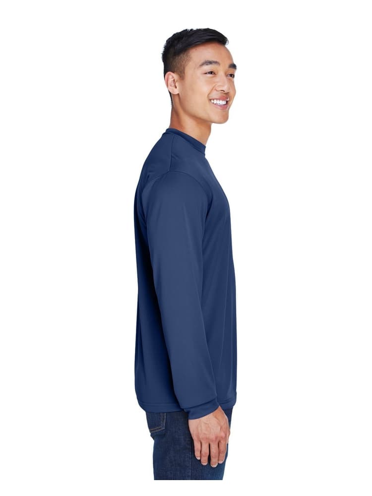 A young male Registered Nurse wearing an UltraClub Men's Cool & Dry Long Sleeve T-Shirt in Navy size 3XL featuring a 100% polyester mesh fabric.