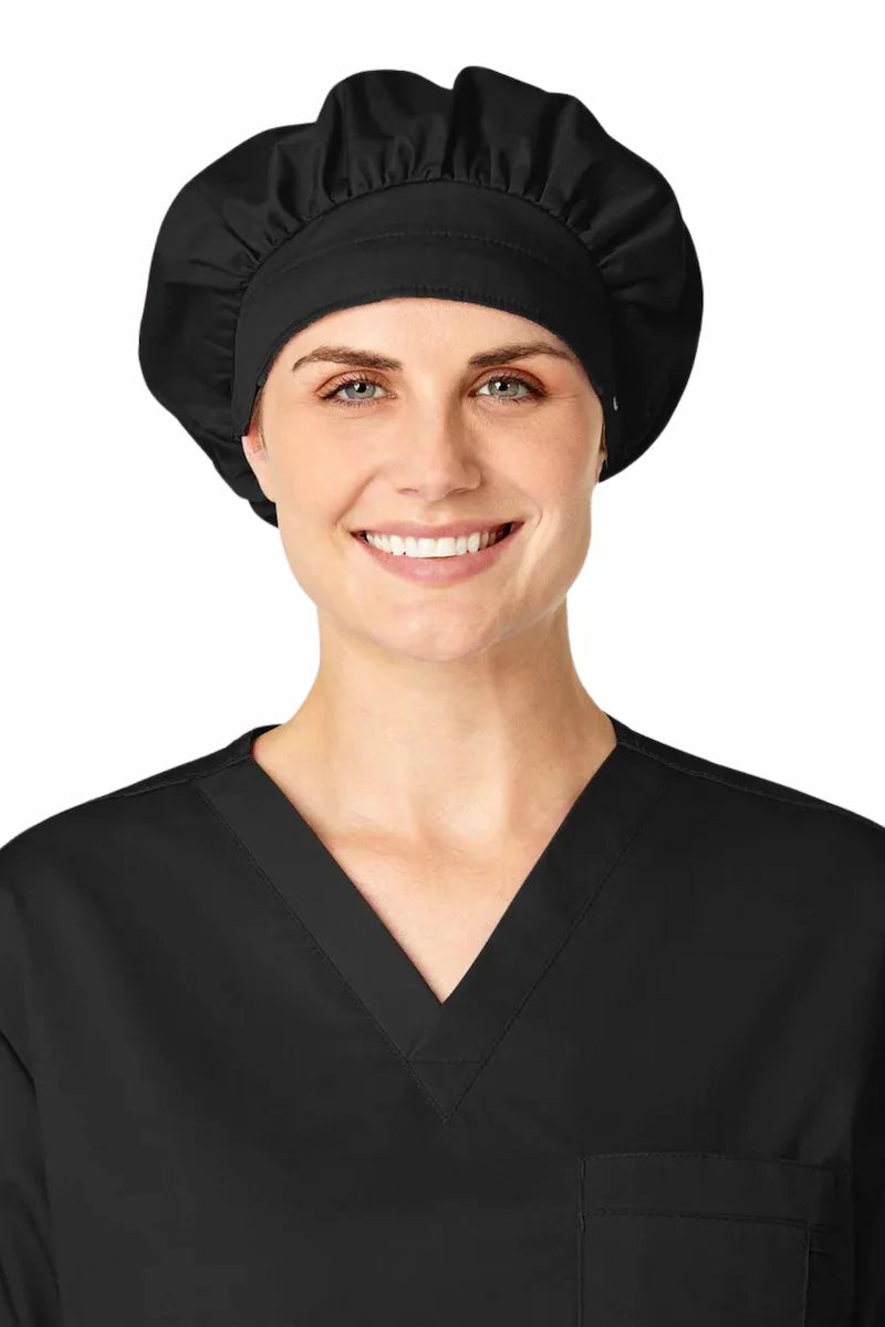 A young female Surgeon displaying the front of the WonderWink Women's Bouffant Scrub Cap in Black featuring a sweat-absorbing terry band.