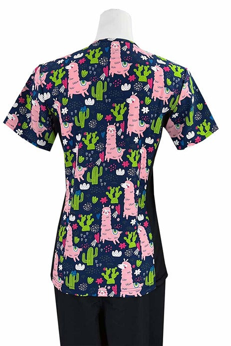 An Essentials Women's Mock Wrap Side Panels Scrub Top in "Llamas in Pink" featuring 2 front patch pockets & 1 exterior utility pocket on the wearer's right side.