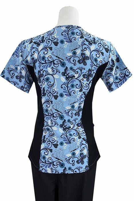 An Essentials Women's Zip Neck Scrub Top in "Blue Whimsey" featuring 2 front patch pockets for all of you on the go storage needs.