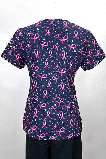 An image of the back of the Revel Women's V-neck Print Scrub Top in "Pink Ribbons & Butterflies" size Large featuring a unique 4-way stretch fabric designed to move with your body all day long.