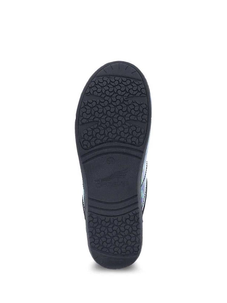 A single Dansko XP 2.0 Nurse Shoe in Watercolor Dots Patent featuring a Patented slip-resistant rubber outsole. Suitable for dry, wet, & oily surfaces.